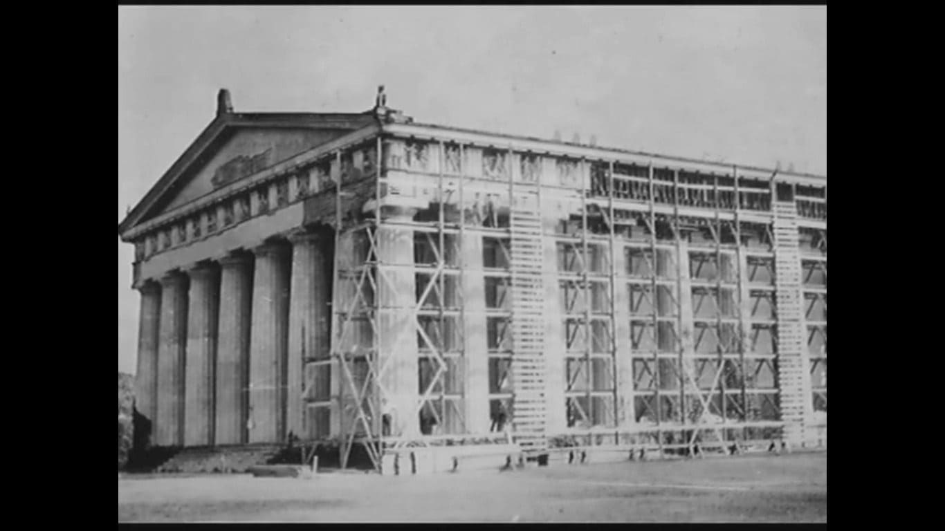 Historic black and white photo of Nashville Parthenon under construction with scaffolding in Centennial Park Tennessee 1920s