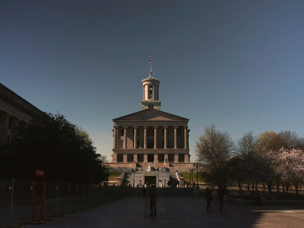 Front facade of the Tennessee State Capitol showing classical columns and dome on Nashville's Capitol Hill