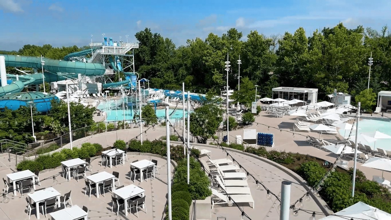 Modern Nashville waterpark features blue waterslides, sparkling pools, and a family-friendly dining area for summer fun