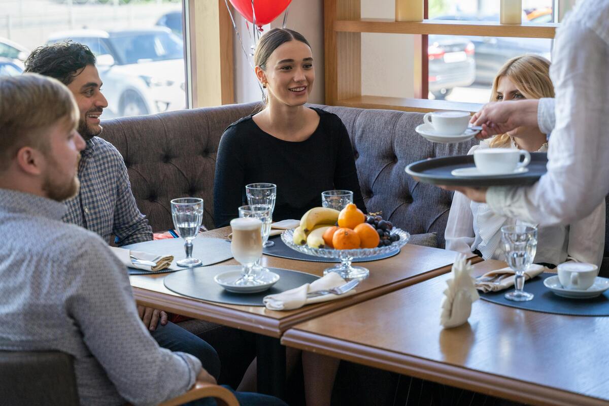 Friends gathered at a cozy café for breakfast, beginning their Nashville day with coffee and conversation