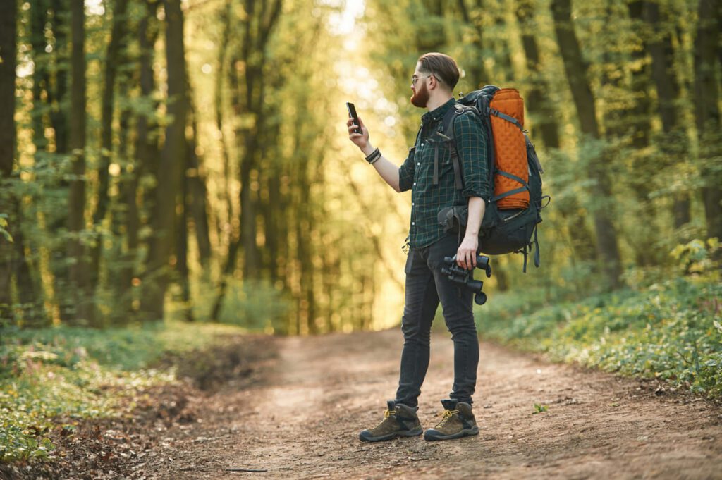 Best Nashville hiking trails explored by modern native hikers using smartphone navigation and professional hiking gear