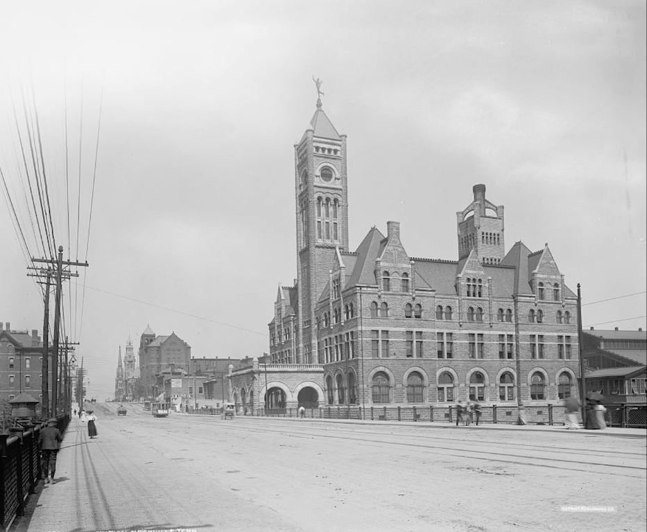 Nashville's municipal building has an ornate clock tower and Romanesque architecture, shown in black and white