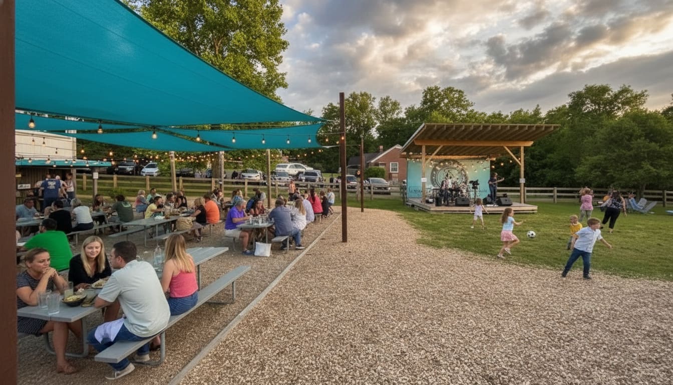 Kids playing beside outdoor tent dining at Nectar Urban Cantina Donelson Nashville under cloudy evening sky