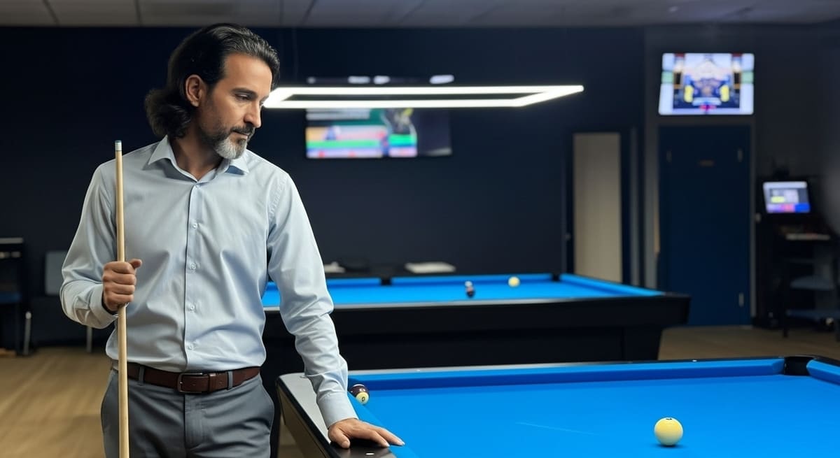 Man lining up his shot at best places to play pool in Nashville like H-Cue's Upstairs Poolroom