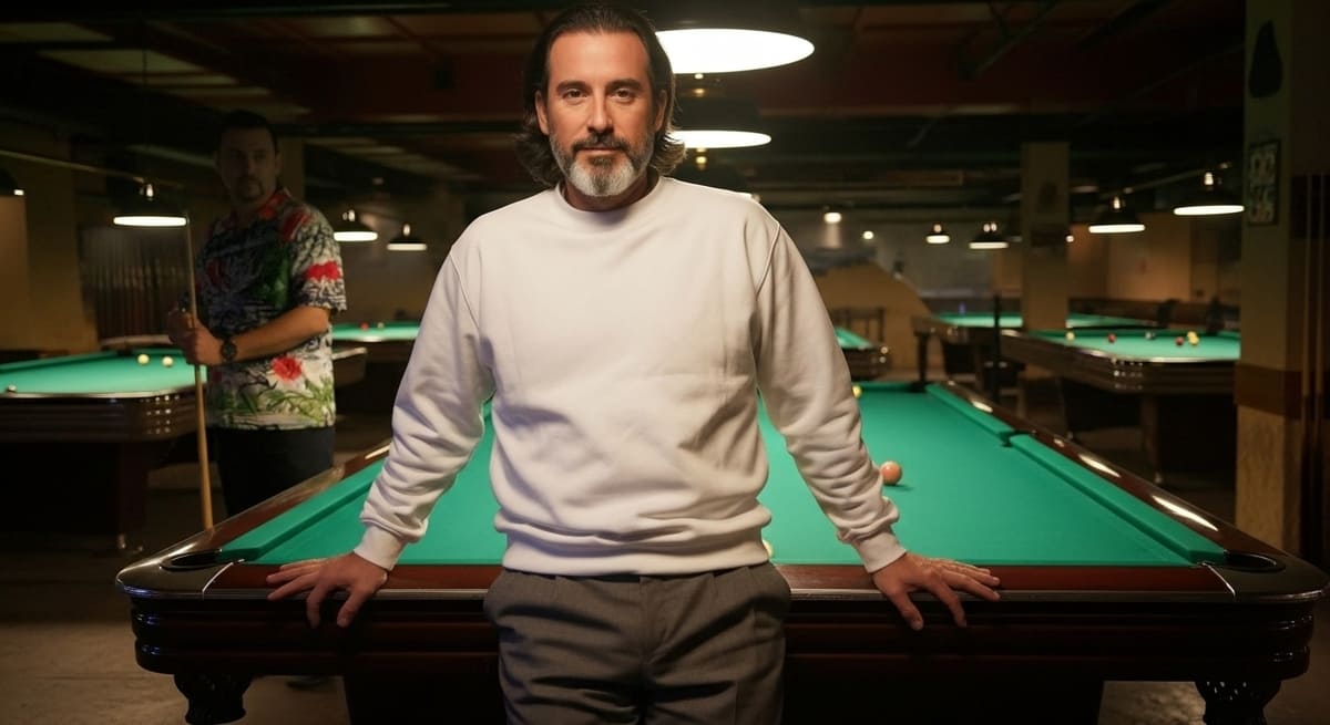 Ethan at table edge with friend playing pool and drinking at Nashville local bar Melrose Billiard Parlor