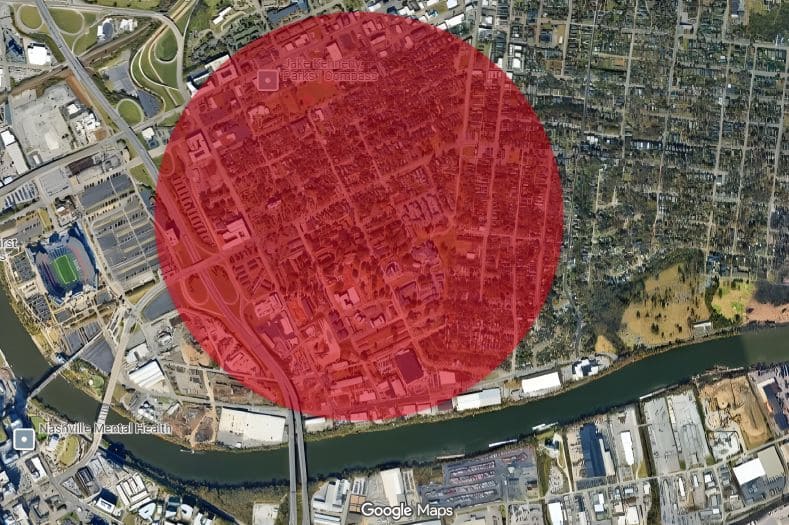 Aerial crime map with large red zone highlighting dangerous areas in East Nashville along Cumberland River and industrial border